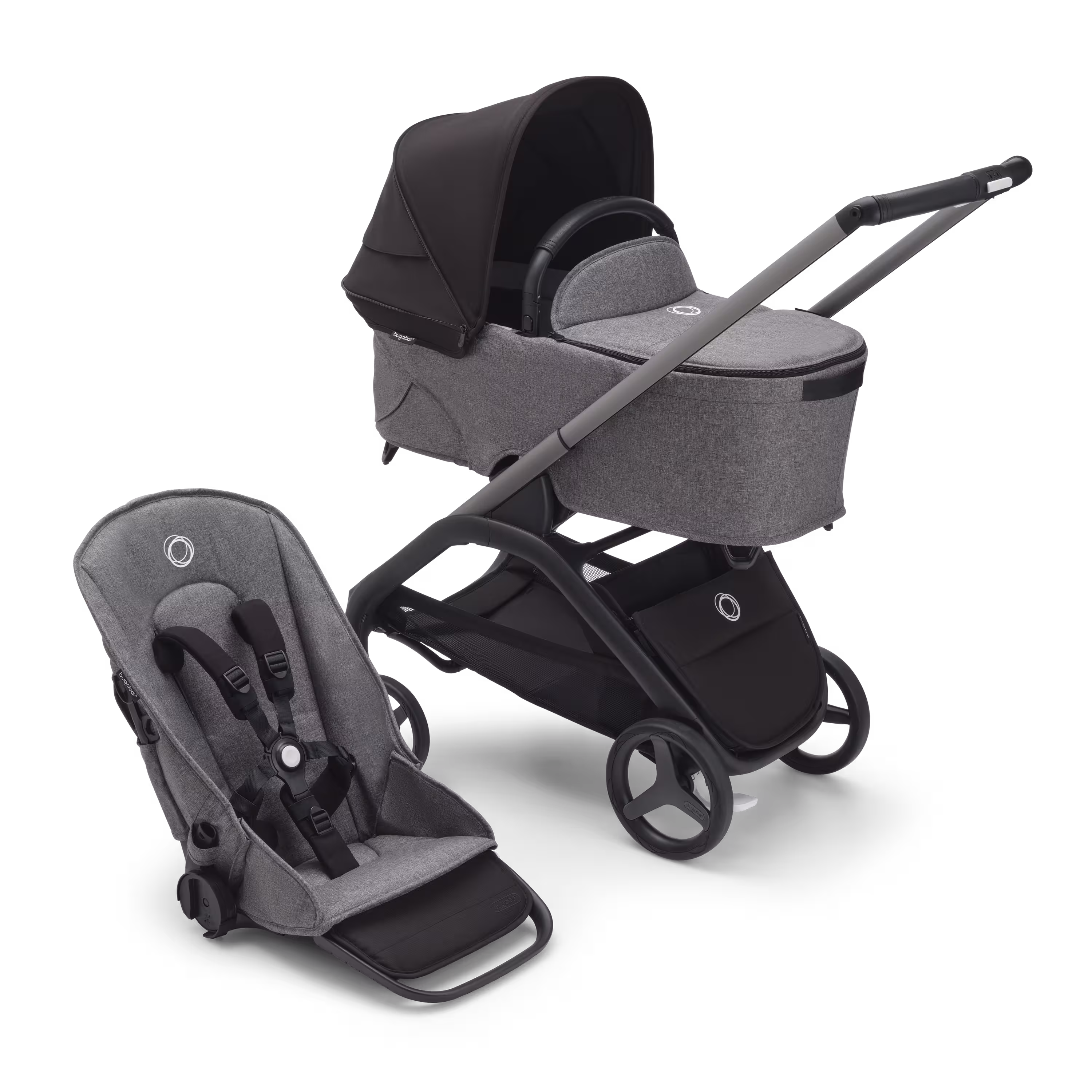 グラファイトのシャーシ、グレーメランジのファブリック、ミッドナイトブラックのサンキャノピーを装着したバガブー ドラゴンフライ キャリーコット＆シートストローラー。 - Main Modal Image Slide 1 of 16