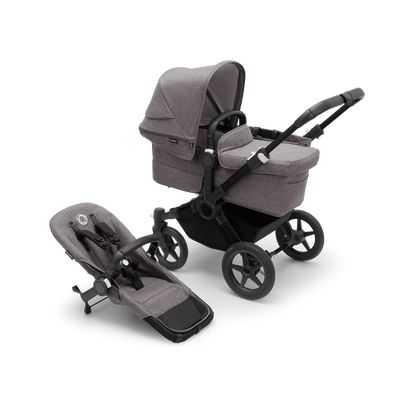 Bugaboo Donkey 5 Mono bassinet stroller with black chassis, grey melange fabrics and grey melange sun canopy, plus seat.