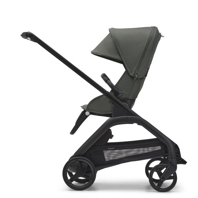 Side view of the Bugaboo Dragonfly seat pushchair with black chassis, forest green fabrics and forest green sun canopy. - Main Image Slide 3 of 18