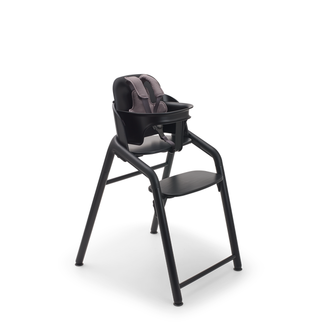 Bugaboo Giraffe chair and baby set with harness in black.