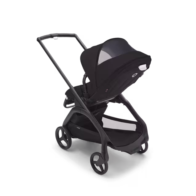 View from behind of the Bugaboo Dragonfly seat stroller, showing the peek-a-boo panel on the sun canopy. - Main Image Slide 11 of 16