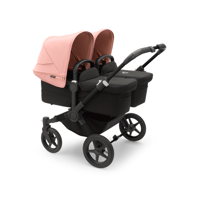 Bugaboo Donkey 5 Twin bassinet and seat stroller black base, midnight black fabrics, morning pink sun canopy