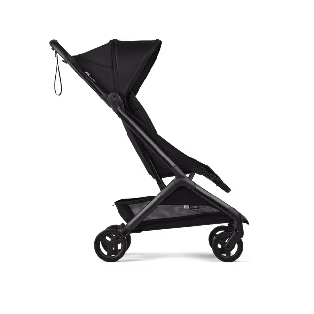 Side view of a Bugaboo Butterfly 2 ultra-compact travel pram with black chassis, Heritage Black fabrics, and Heritage Black sun canopy. - Main Image Slide 2 of 9