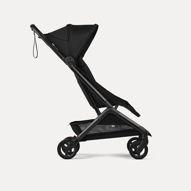 Side view of a Bugaboo Butterfly 2 ultra-compact travel pram with black chassis, Heritage Black fabrics, and Heritage Black sun canopy. - Main Image Slide 2 of 9