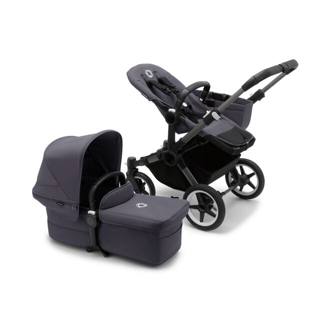 Bugaboo Donkey 5 Mono seat stroller with graphite chassis and stormy blue fabrics, plus bassinet with stormy blue sun canopy.