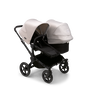 Bugaboo Donkey 5 Duo seat and bassinet stroller with black chassis, midnight black fabrics and misty white sun canopy. - Thumbnail Slide 1 of 12