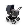 Bugaboo Fox 3 bassinet stroller with graphite frame, grey fabrics, and stormy blue sun canopy. - Thumbnail Slide 2 of 7
