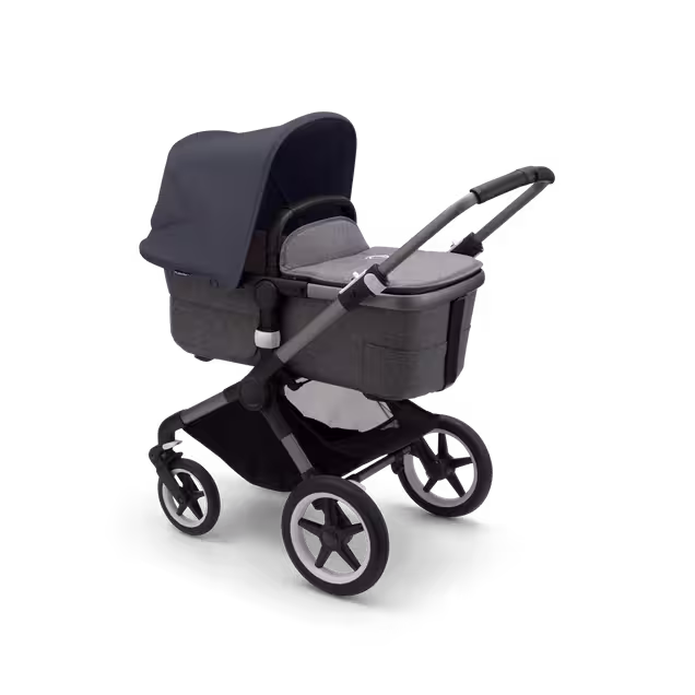 Bugaboo Fox 3 bassinet stroller with graphite frame, grey fabrics, and stormy blue sun canopy. - Main Image Slide 2 of 7