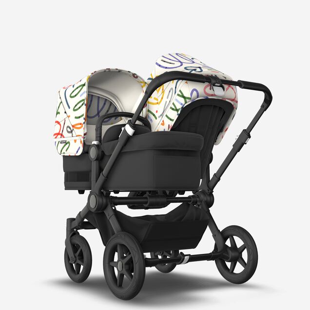 Bugaboo Donkey 5 Duo double stroller black base, midnight black fabrics, art of discovery white sun canopy - Main Image Slide 1 of 10
