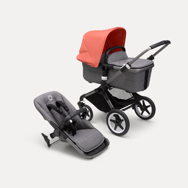 Bugaboo Fox 3 bassinet and seat stroller with graphite frame, grey fabrics, and red sun canopy. - Main Image Slide 1 of 7