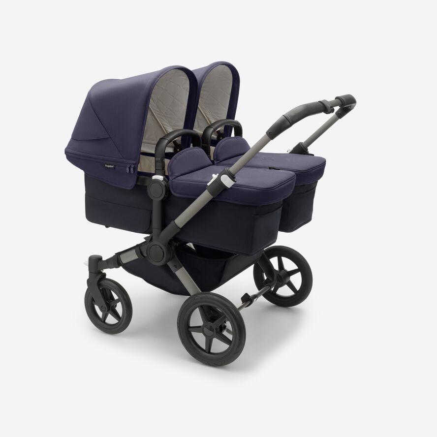 Bugaboo Donkey 5 Twin bassinet and seat stroller graphite base, classic collection dark navy fabrics, classic collection dark navy sun canopy