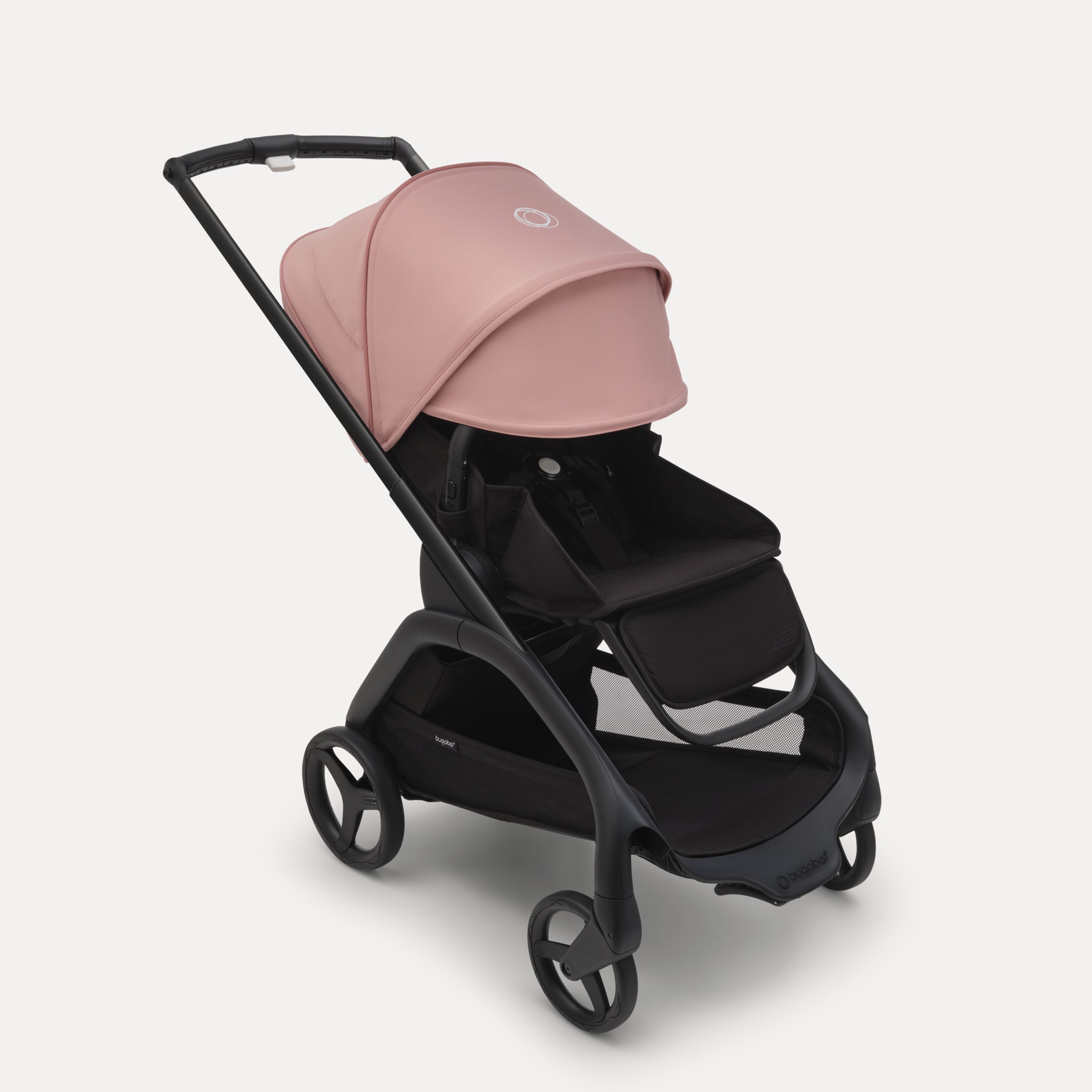 Carrito con silla Bugaboo Dragonfly con chasis negro, fundas negro medianoche y capota rosa amanecer. La capota está completamente extendida. - Main Modal Image Slide 3 of 16