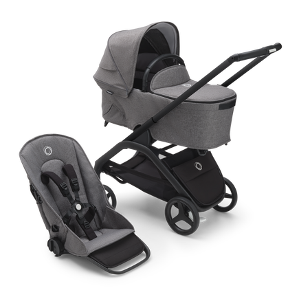 Bugaboo Dragonfly bassinet and seat stroller with black chassis, grey melange fabrics and grey melange sun canopy.
