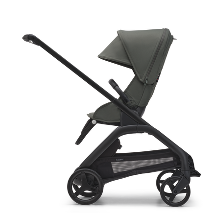 Side view of the Bugaboo Dragonfly seat pram with black chassis, forest green fabrics and forest green sun canopy.