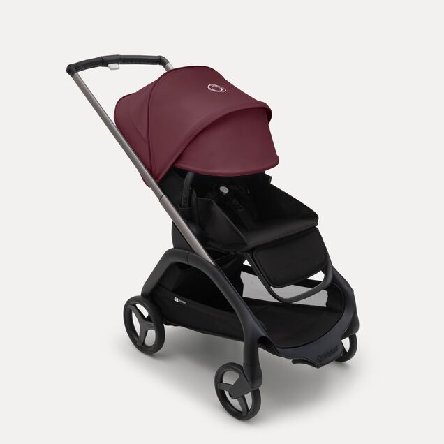 ブラックのシャーシ、グレーメランジのファブリック、グレーメランジのサンキャノピーを装着したバガブー ドラゴンフライ シートストローラー。 最大限に伸長させたサンキャノピー。 - Main Image Slide 3 of 16