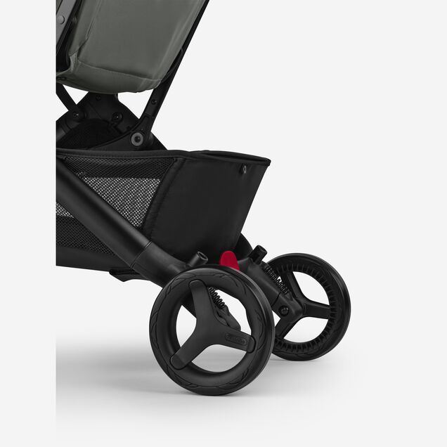 A close up of the rear wheels of the Bugaboo Butterfly 2 travel pram. - Main Image Slide 7 of 9