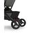 A close up of the rear wheels of the Bugaboo Butterfly 2 travel pram. - Thumbnail Slide 7 of 9