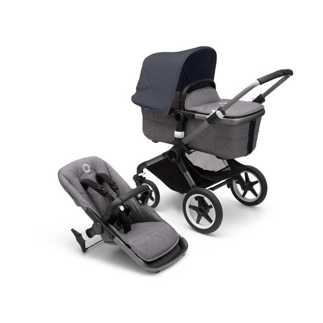 Bugaboo Fox 3 bassinet and seat stroller with graphite frame, grey fabrics, and stormy blue sun canopy.
