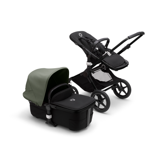 Bugaboo Fox 3 bassinet and seat stroller with black frame, black fabrics, and forest green sun canopy.