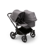 Bugaboo Donkey 5 Duo seat and bassinet stroller with black chassis, grey melange fabrics and grey melange sun canopy. - Thumbnail Slide 1 of 12