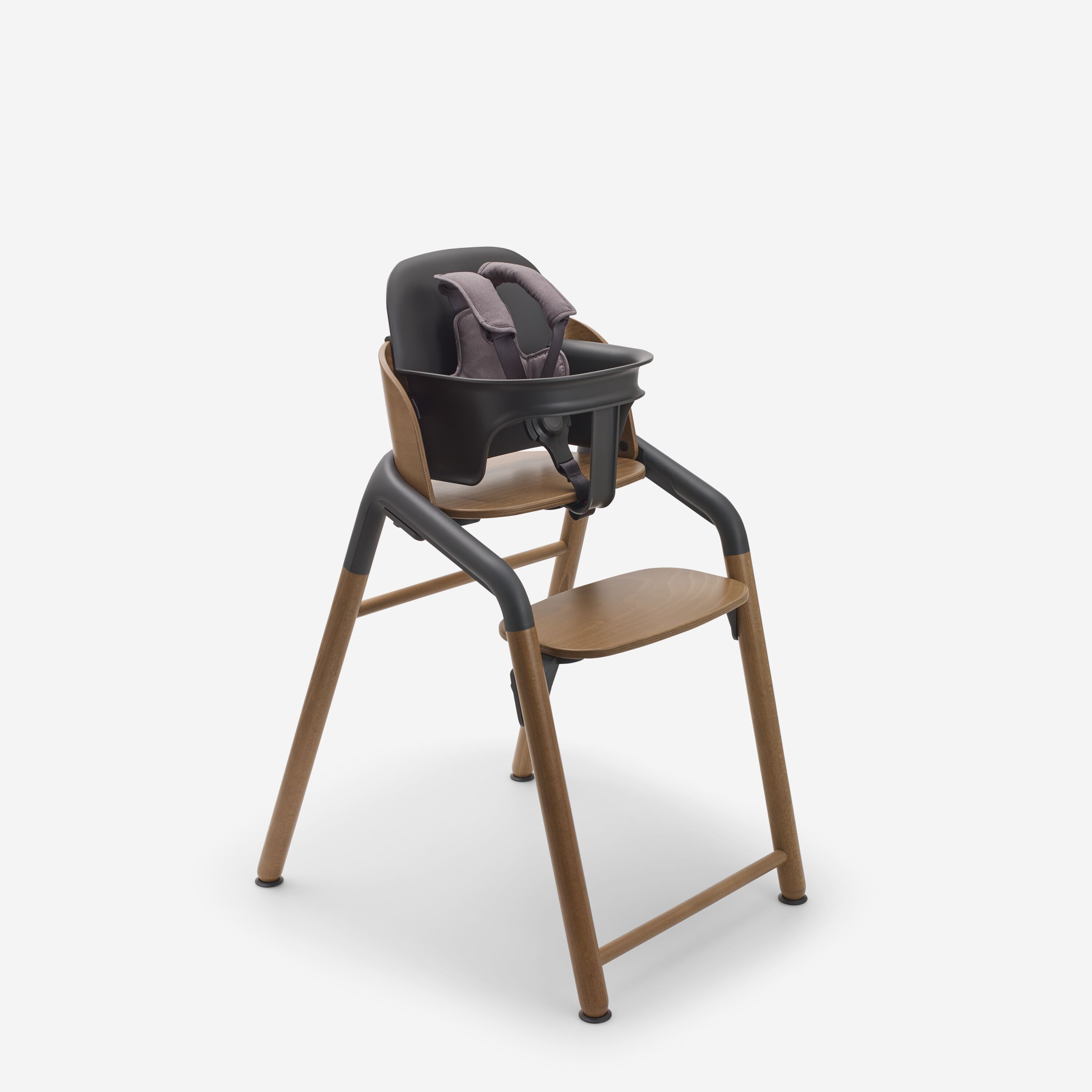 Bugaboo Giraffe chair in warm wood/grey, with baby set and harness in grey. - Main Modal Image Slide 2 of 4