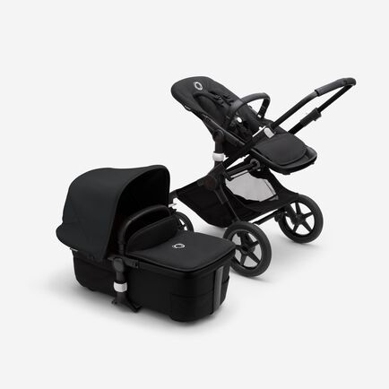 Bugaboo Fox 3 bassinet and seat stroller with black frame, black fabrics, and black sun canopy.