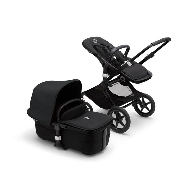Bugaboo Fox 3 bassinet and seat stroller with black frame, black fabrics, and black sun canopy. - Main Image Slide 5 of 7