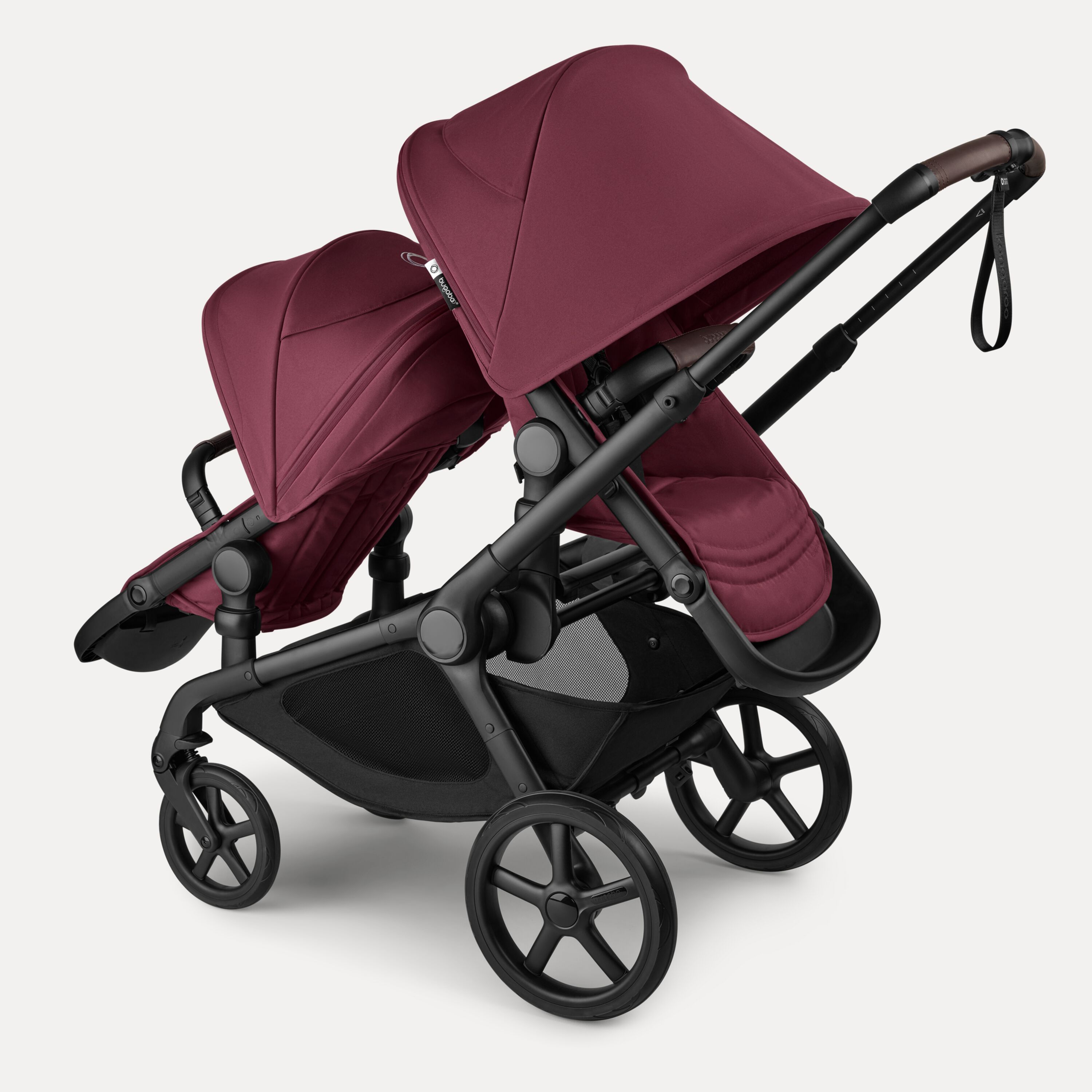 Bugaboo Kangaroo 2-in-1 tandem stroller with one seat facing the parent and one seat facing the world, with Dark Cherry fabrics and Dark Cherry sun canopies. - Main Modal Image Slide 5 of 18