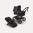 Bugaboo Fox 5 Renew bassinet and seat 2-in-1 stroller, with black chassis, Heritage Black fabrics, and Deep Indigo sun canopy.