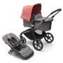 Bugaboo Fox 5 bassinet and seat stroller with graphite chassis, grey melange fabrics and sunrise red sun canopy. - Thumbnail Slide 1 of 16