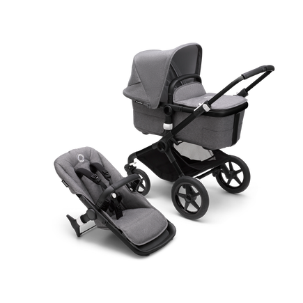 Bugaboo Fox 3 bassinet and seat stroller with black frame, grey fabrics, and grey sun canopy. - view 1