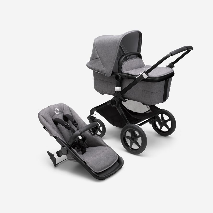 Bugaboo Fox 3 bassinet and seat stroller with black frame, grey fabrics, and grey sun canopy.