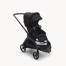 Bugaboo Dragonfly seat pram with black chassis, midnight black fabrics and midnight black sun canopy.
