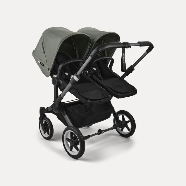 Bugaboo Donkey 5 twin stroller graphite base, midnight black fabrics, forest green sun canopy - Main Image Slide 3 of 12