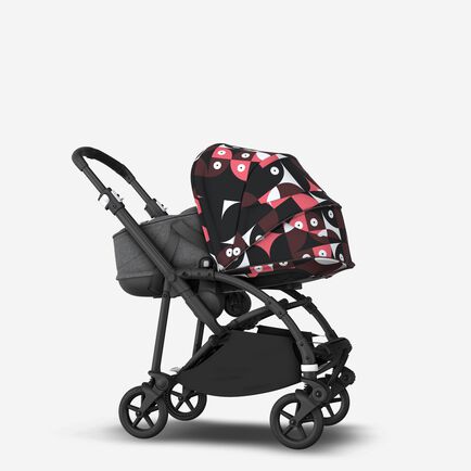 Bugaboo Bee 6 bassinet and seat stroller black base, grey fabrics, animal explorer pink/ red sun canopy