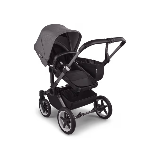 Refurbished Bugaboo Donkey 5 Mono bassinet and seat stroller graphite base, midnight black fabrics, grey mélange sun canopy - Main Image Slide 2 of 11