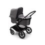 Bugaboo Fox 3 bassinet stroller with black frame, grey melange fabrics, and grey melange sun canopy. - Thumbnail Modal Image Slide 2 of 7