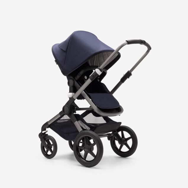 Bugaboo Fox 3 seat pushchair with graphite frame, dark navy fabrics, and dark navy sun canopy. - Main Image Slide 11 of 13