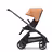 Side view of the Bugaboo Dragonfly seat stroller with graphite chassis, midnight black fabrics and island coral sun canopy. - Thumbnail Slide 2 of 16