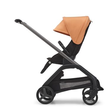 Side view of the Bugaboo Dragonfly seat stroller with graphite chassis, midnight black fabrics and island coral sun canopy. - view 2