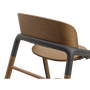 Back of the Bugaboo Giraffe chair in warm wood/grey.