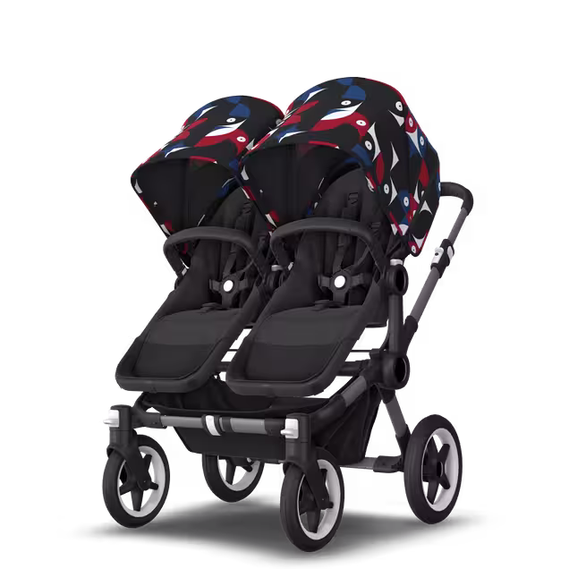 Bugaboo Donkey 5 twin stroller graphite base, midnight black fabrics, animal explorer red/blue sun canopy - Main Image Slide 2 van 12