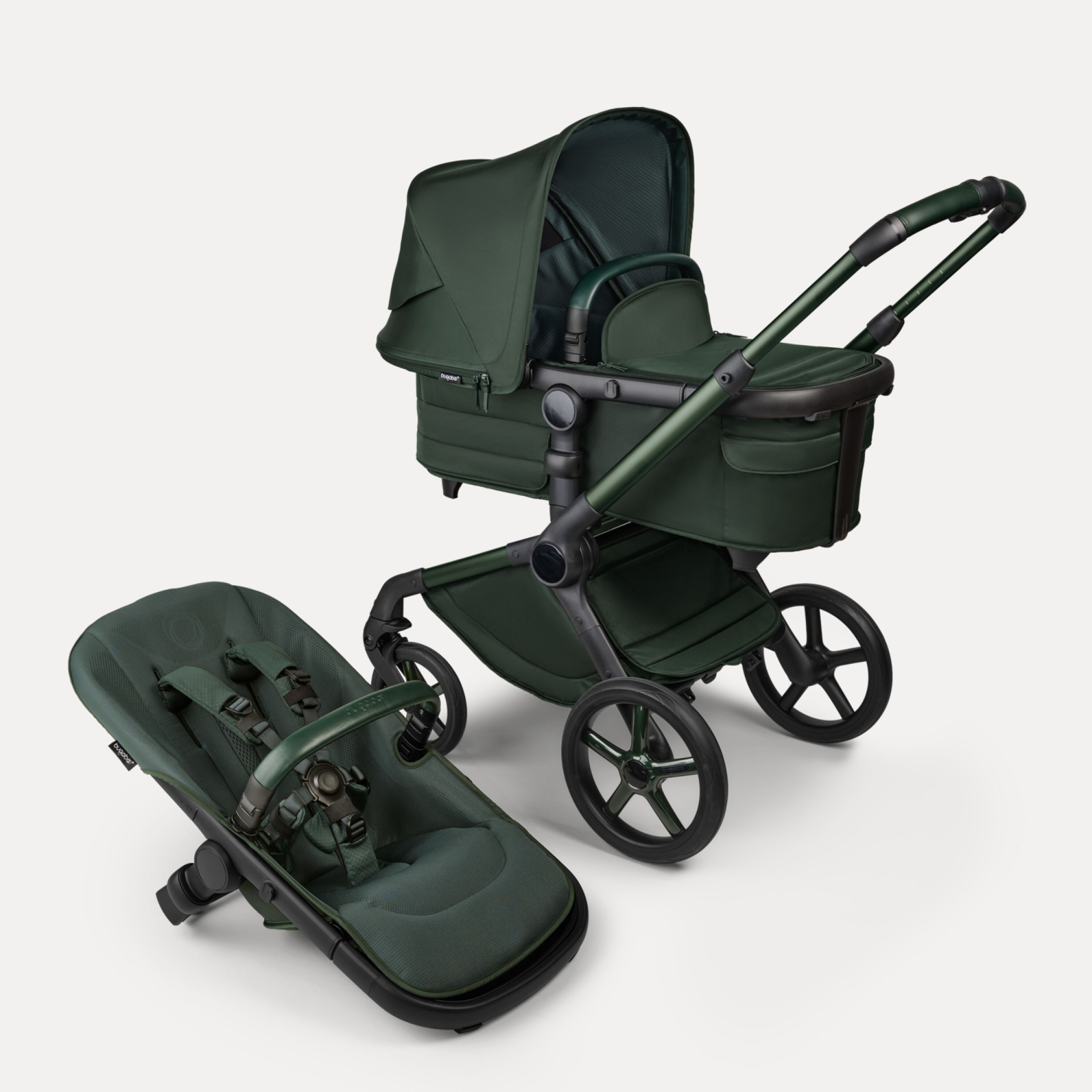 Bugaboo Fox 5 Noir Limited Edition bassinet and seat stroller, with Midnight Green chassis, Midnight Green fabrics, and Midnight Green sun canopy. - Main Modal Image Slide 1 of 15