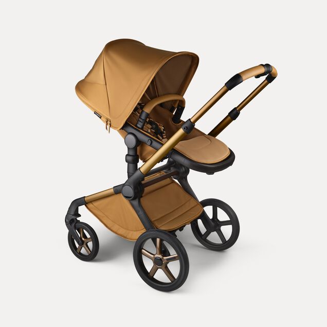 A Bugaboo Fox 5 Noir Limited Edition seat stroller in Amber Glow colorway. - Main Image Slide 2 of 15