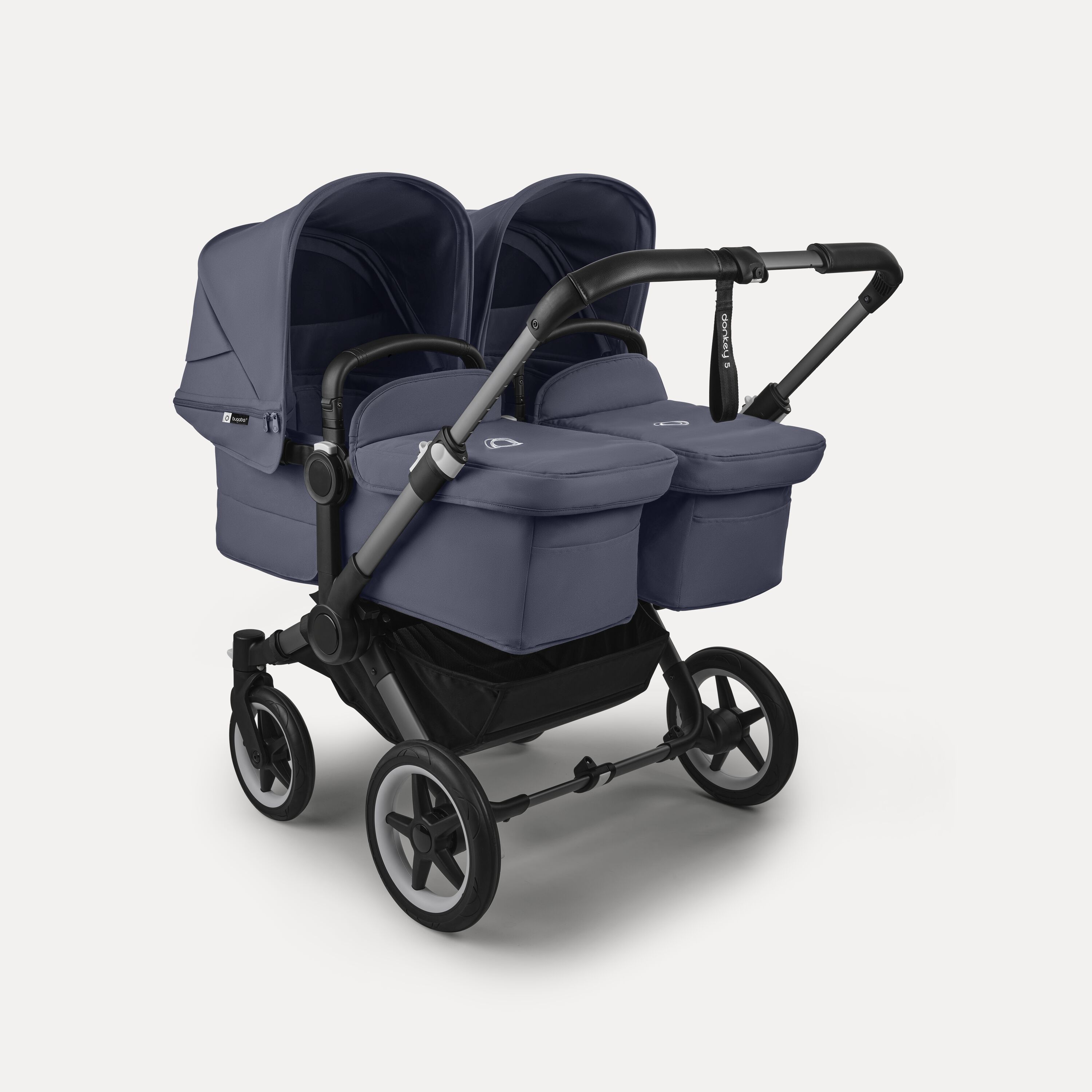 Bugaboo Donkey 5 twin stroller graphite base, stormy blue fabrics, stormy blue sun canopy - Main Modal Image Slide 1 of 12