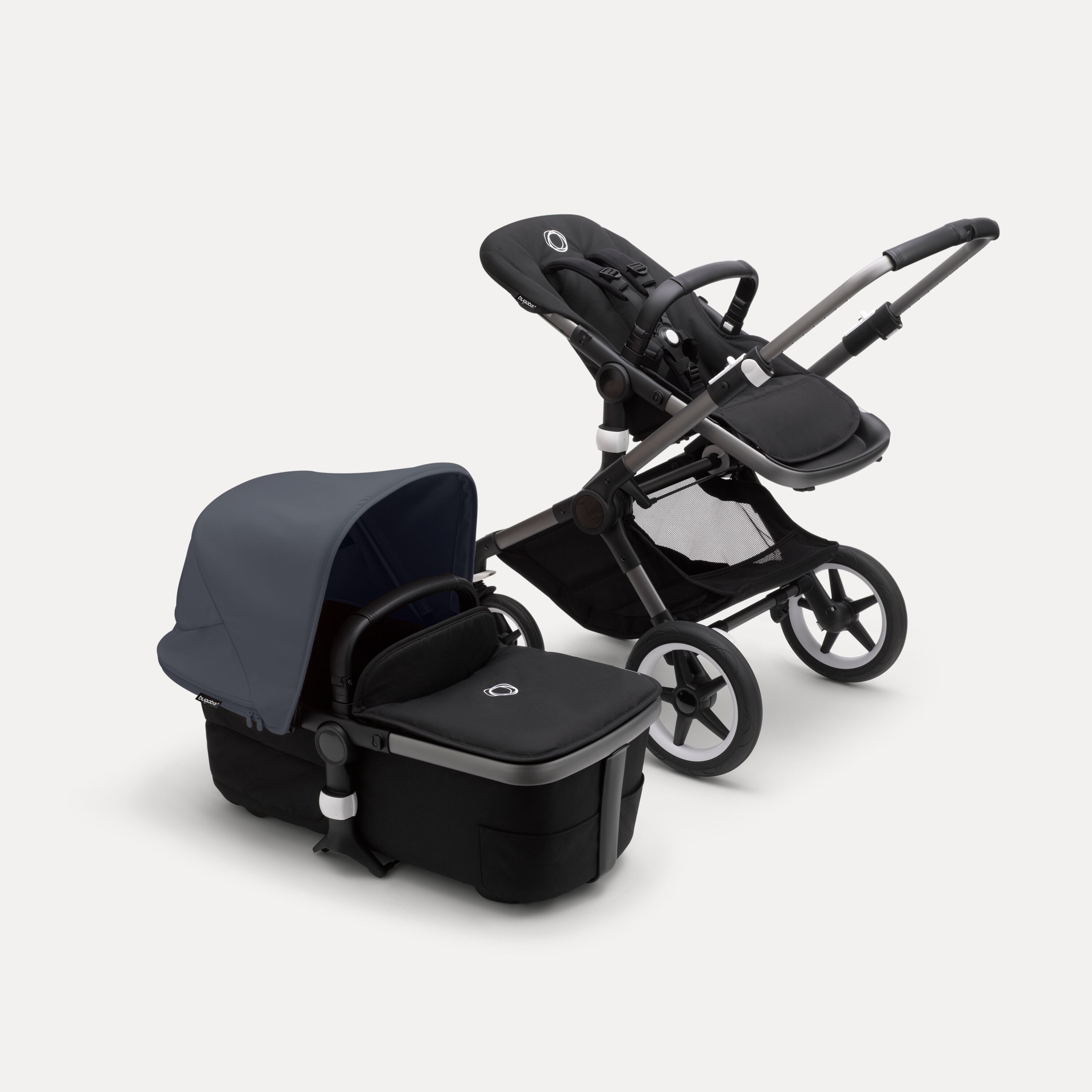 Bugaboo Fox 3 bassinet and seat stroller with black frame, grey fabrics, and stormy blue sun canopy. - Main Modal Image Slide 6 of 7