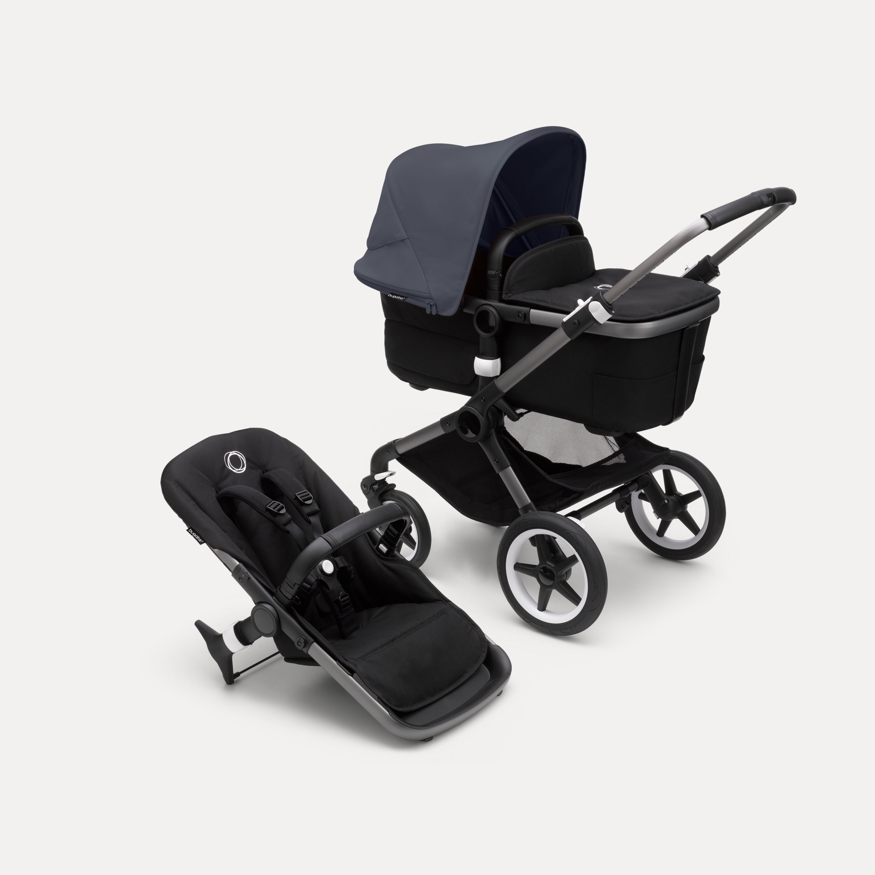 Bugaboo Fox 3 bassinet and seat stroller with black frame, grey fabrics, and stormy blue sun canopy. - Main Modal Image Slide 5 of 7