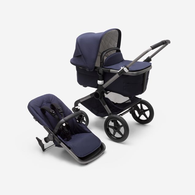 Bugaboo Fox 3 carrycot and seat pushchair with graphite frame, dark navy fabrics, and dark navy sun canopy. - Main Image Slide 1 of 13