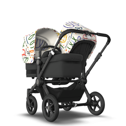 Bugaboo Donkey 5 Duo bassinet and seat stroller black base, midnight black fabrics, art of discovery white sun canopy - view 1