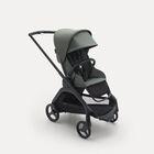 Carrito con silla Bugaboo Dragonfly con chasis negro, fundas verde bosque y capota verde bosque.